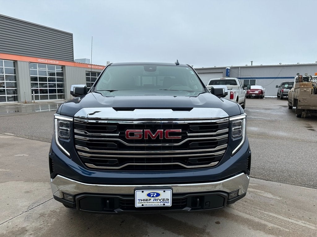 Used 2023 GMC Sierra 1500 SLT with VIN 1GTUUDE8XPZ247298 for sale in Thief River Falls, Minnesota